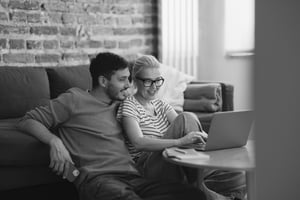 Couple Using Laptop Smiling B&W-1